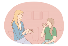 Dos personas hablando en señas